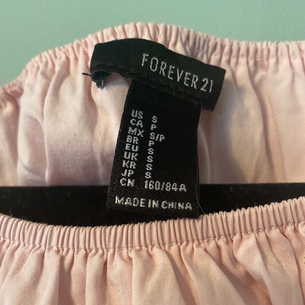 Sleeveless Ruffle Top - Picture 2 of 3